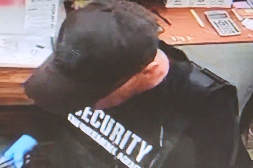 Authorities say 54-year-old Robert Rosado walked into an auto-repair shop in Philadelphia on June 8 wearing a tactical vest, badge and a holstered gun and announced he was an ICE agent.
