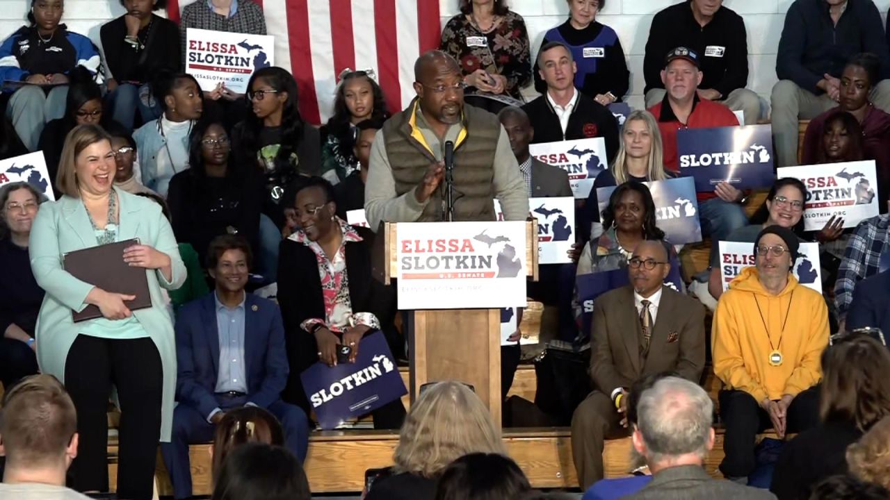 In this still from video, Sen. Raphael Warnock speaks at a campaign event for Elissa Slotkin in Michigan on Friday.