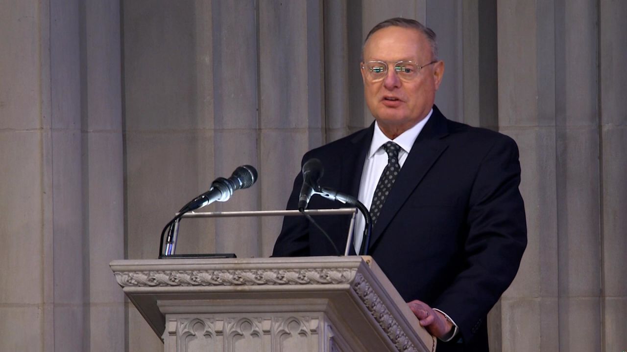 Ted Mondale reads a tribute to former President Jimmy Carter written by his father, former Vice President Walter Mondale, on Thursday.