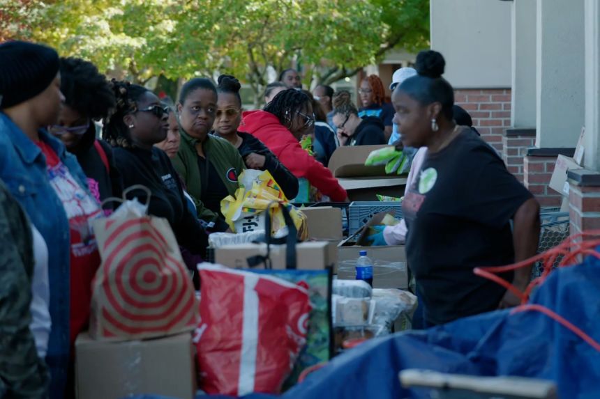 A line forms at a DC-area food bank on October 21, 2025.