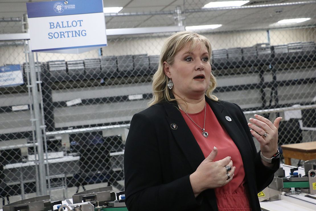 Cari-Ann Burgess, the Washoe County registrar of voters, speaks with reporters and concerned citizens in Reno on January 23, 2024.