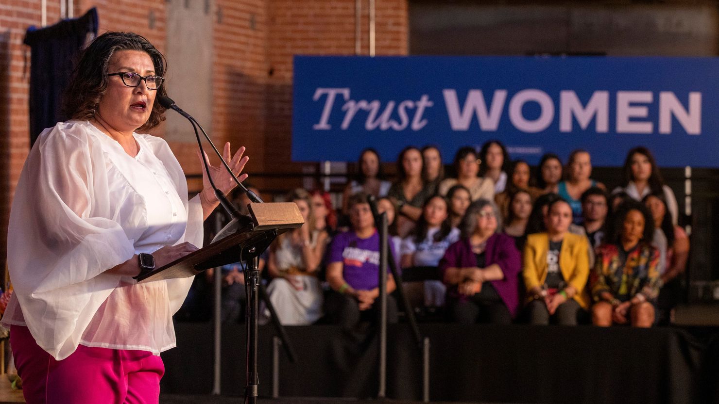 In this June 2024 photo, JoAnna Mendoza speaks at an event before Vice President Kamala Harris in Phoenix.