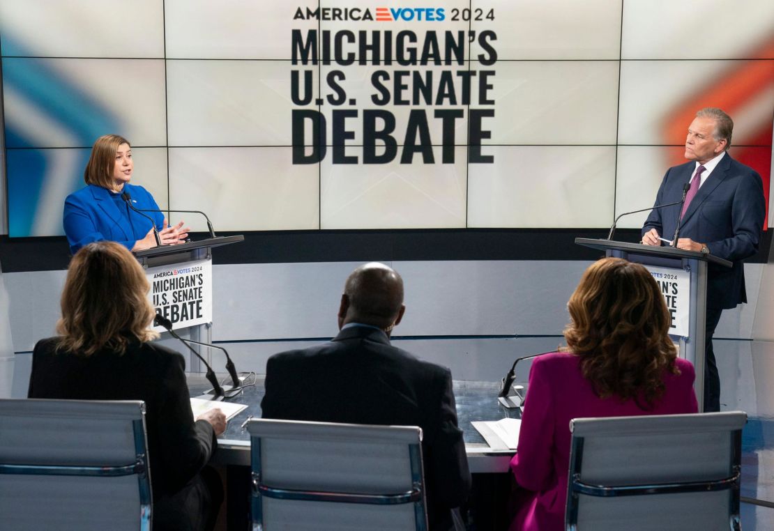 Rep. Elissa Slotkin and former Rep. Mike Rogers debate on Monday, October 14, with moderators Alicia Smith, Chuck Stokes and Carolyn Clifford of WXYZ-TV in Southfield, Michigan.