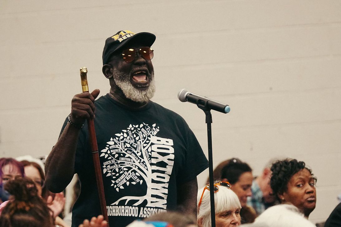An attendee speaks during a public hearing on the permit application from xAI for use of 15 gas turbines at its Paul R. Lowry Road site on April 25, 2025, at Fairley High School in Memphis, Tennessee.