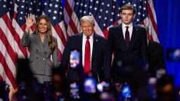 Former first lady Melania Trump, former President Donald Trump and Barron Trump at the Palm Beach County Convention Center in West Palm Beach, Florida, on Wednesday, November 6.
