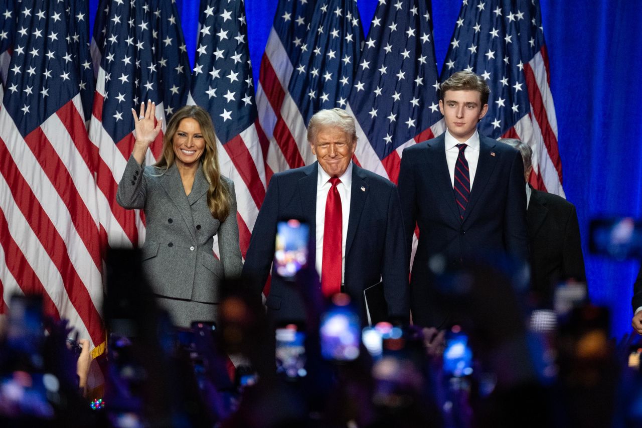 Former first lady Melania Trump, former President Donald Trump and Barron Trump at the Palm Beach County Convention Center in West Palm Beach, Florida, on Wednesday, November 6, 2024.