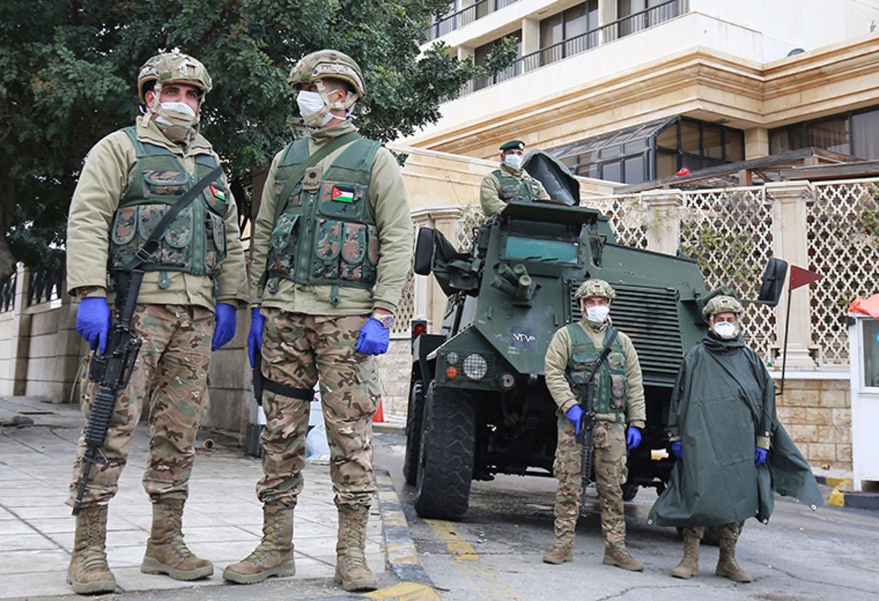 Jordanian soldiers keep watch on Wednesday, March 18, in the capital Amman as Jordan takes measures to fight the spread of the coronavirus. 