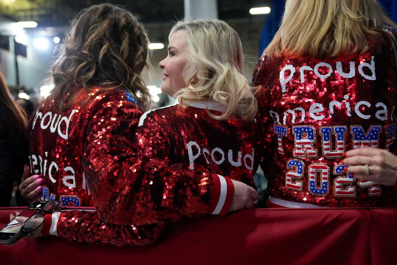 Supporters are seen at Trump's caucus night party in Des Moines.