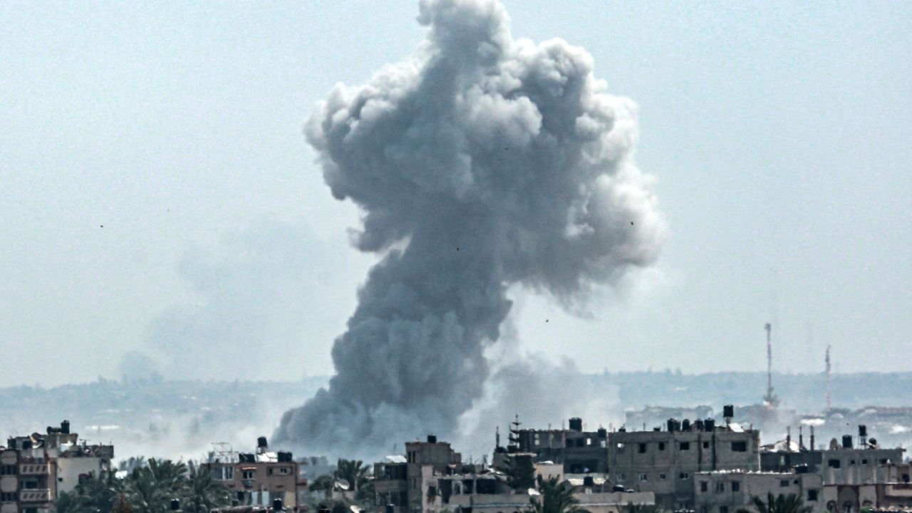 A smoke plume billows followin Israeli bombardment uptown of Nuseirat, Gaza, on April 23. 