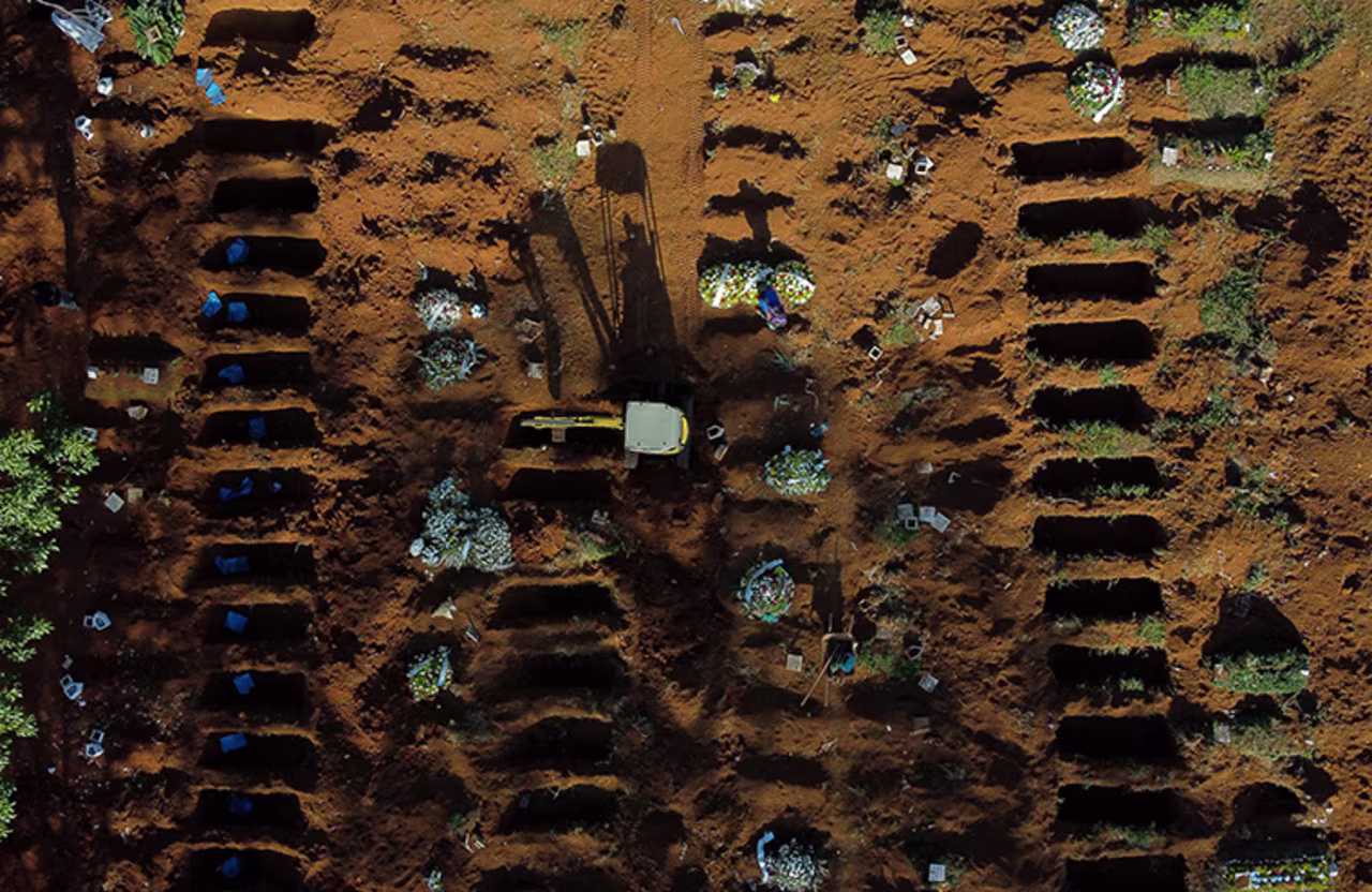 An aerial view of open graves amidst the coronavirus pandemic at Vila Formosa Cemetery on Monday, May 18, in Sao Paulo, Brazil. T