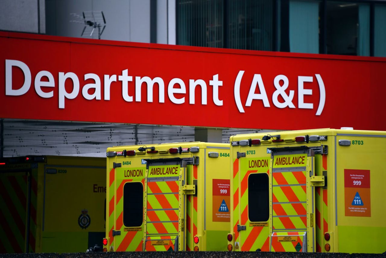 Ambulances are parked outside the Emergency Department of St Thomas' Hospital, one of the many hospitals dealing with coronavirus patients in London, on Wednesday, April 1. 