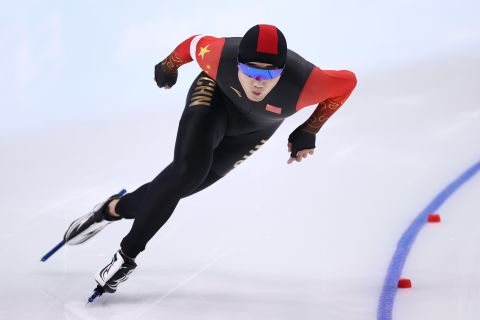 China's Gao Tingyu on the way to setting a new Olympic record time of 34.32 during the men's 500m speed skating on Saturday.