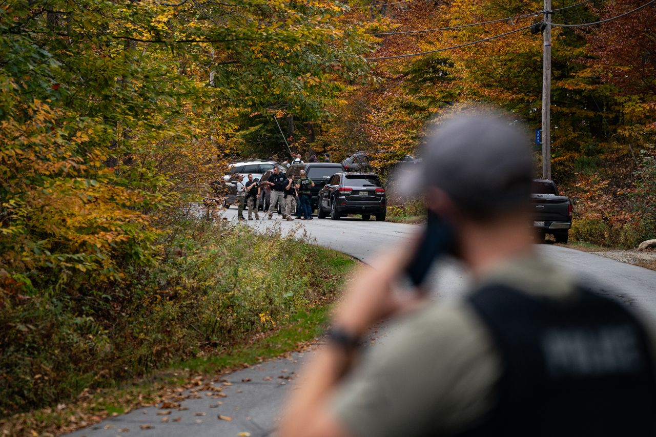 Law enforcement personnel gather in Bowdoin, Maine, on Thursday, October 26. 