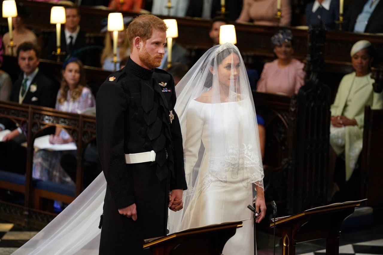 Prince Harry and Meghan Markle stand together during their wedding at St George's Chapel in Windsor, England, on May 19, 2018.