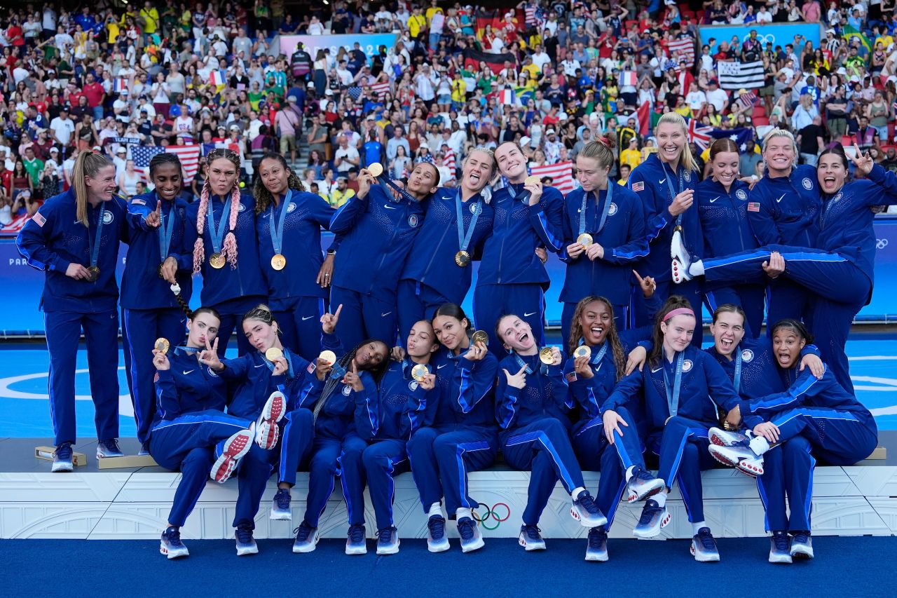 The US team poses during the medal ceremony. 