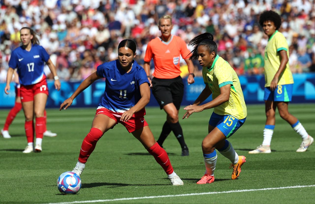 USA’s Sophia Smith, left, controls the ball during the women’s gold medal soccer match against Brazil on August 10. 