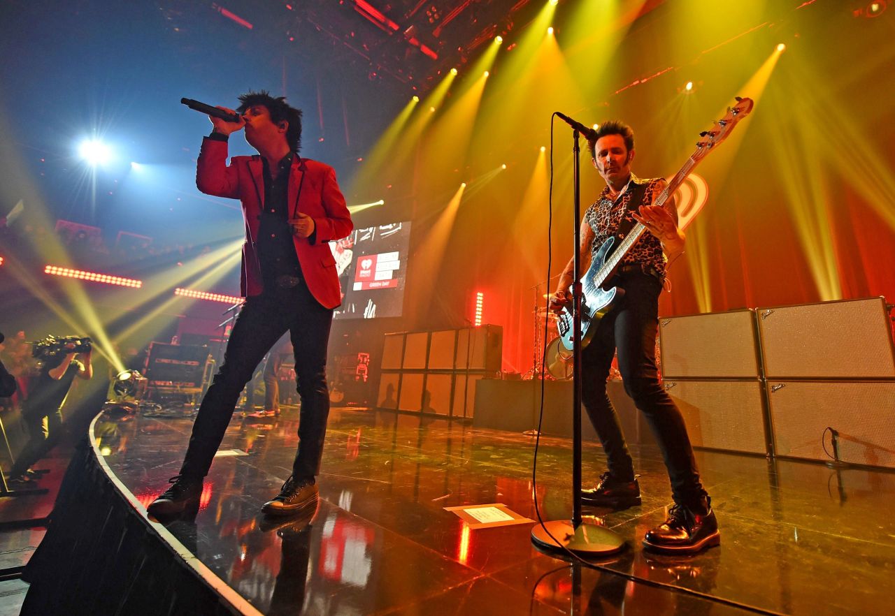 Billie Joe Armstrong and Mike Dirnt of Green Day perform onstage during the iHeartRadio Album Release Party on February 7 in Burbank, California.