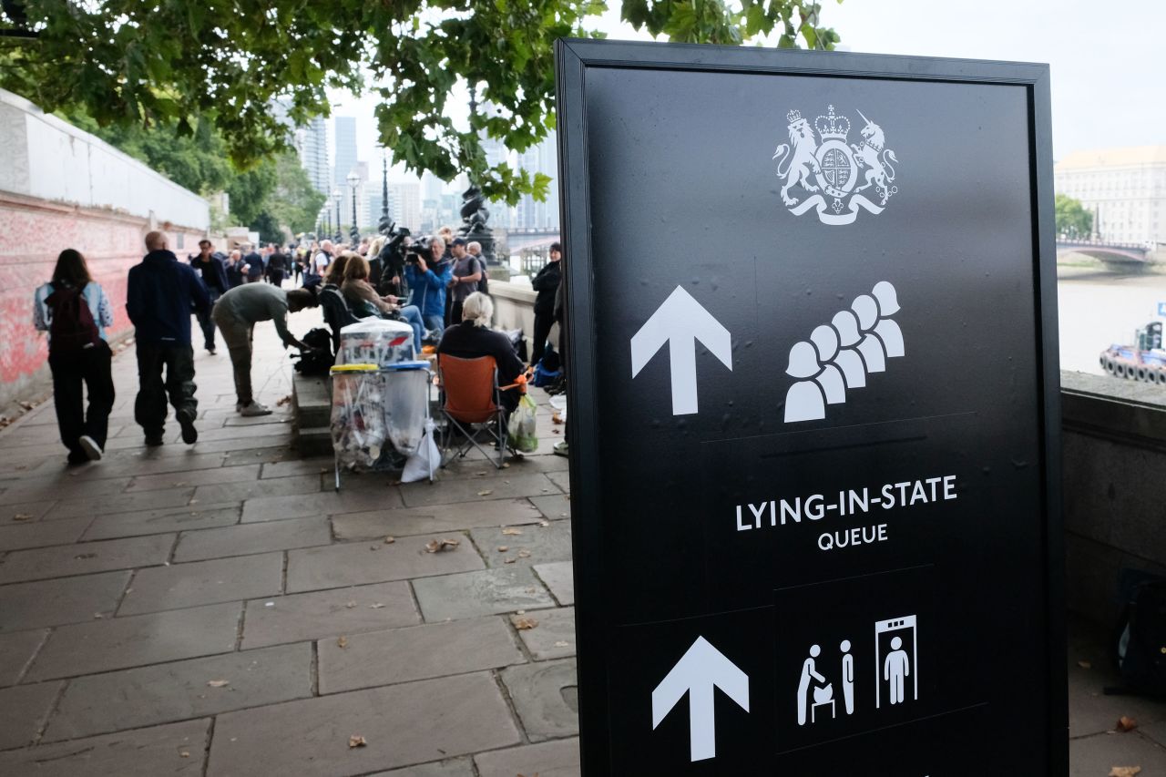 A sign directs people to the queue for Westminster Hall on Wednesday.