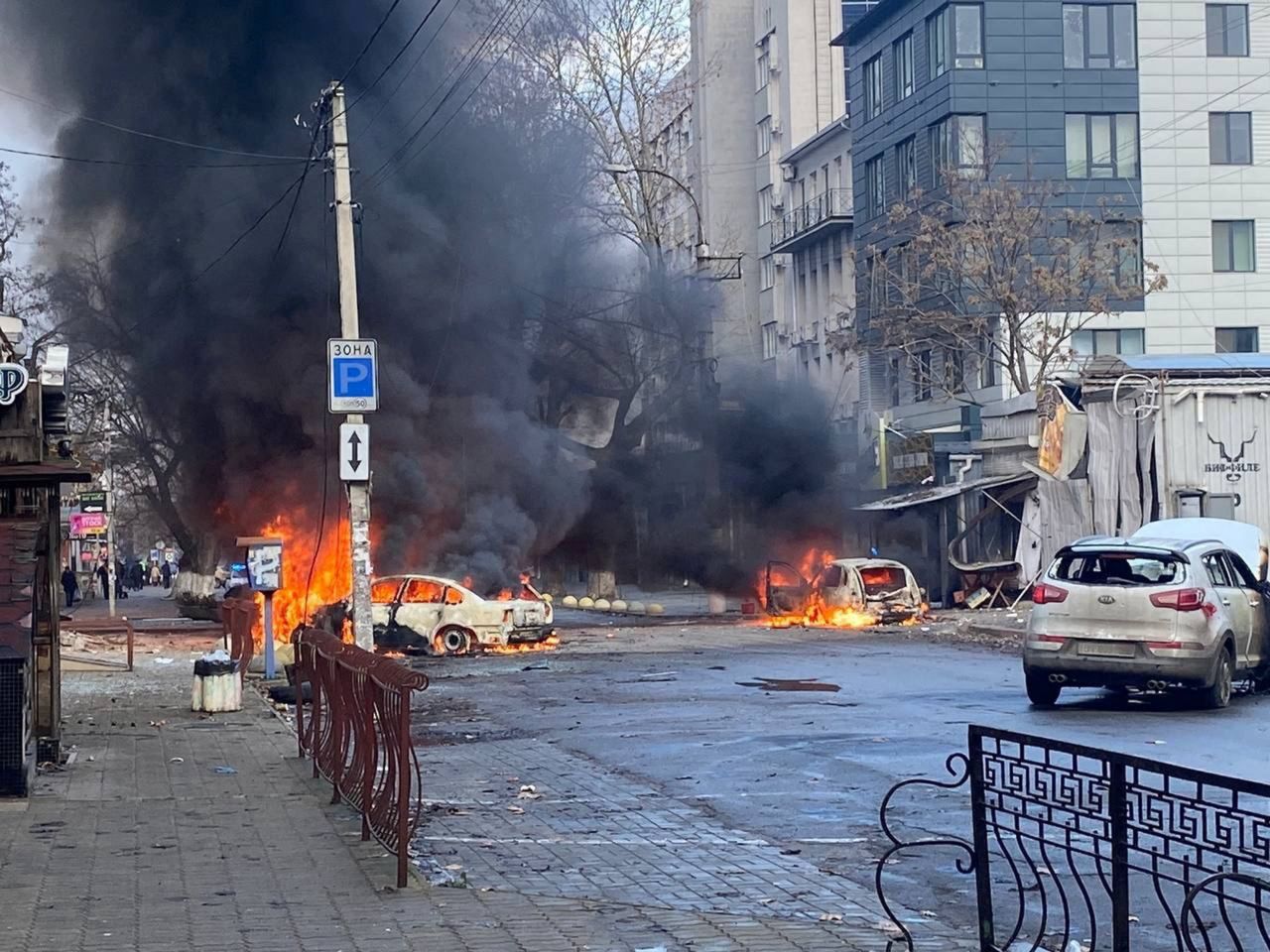 Cars burn on a street after a Russian strike in?Kherson on Saturday.