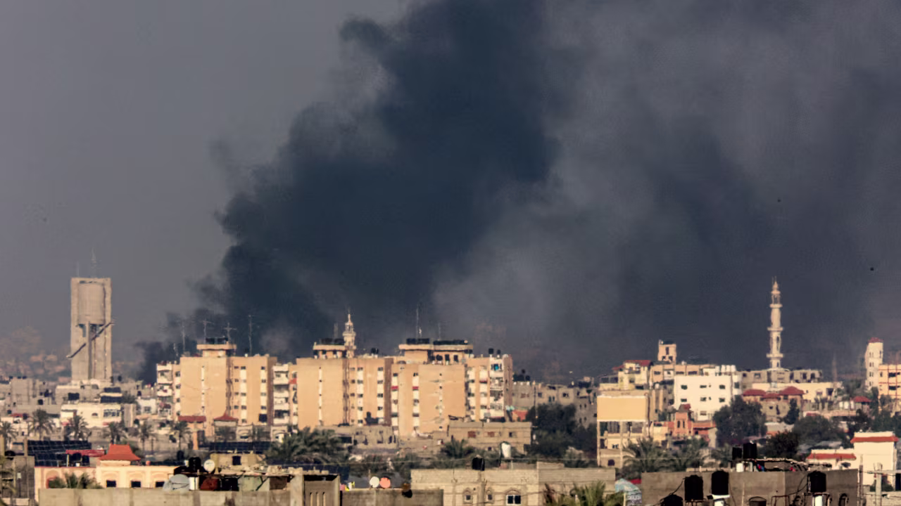Smoke billows over Khan Younis, Gaza, on Tuesday.