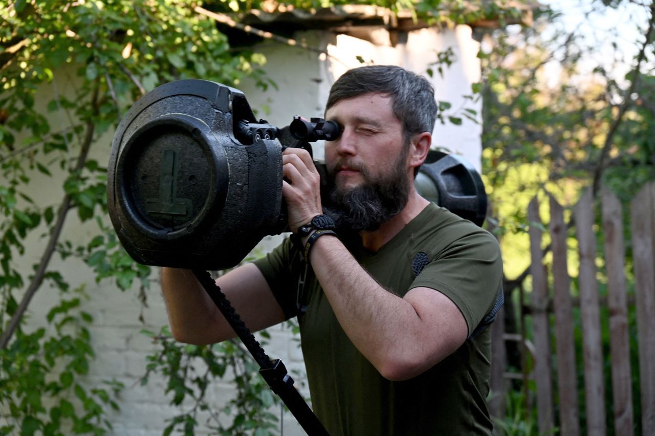 A Ukrainian serviceman checks a just received Next Generation Light Anti-Armour Weapon (NLAW) not far from the Ukrainian town of Chuguiv, on June 9