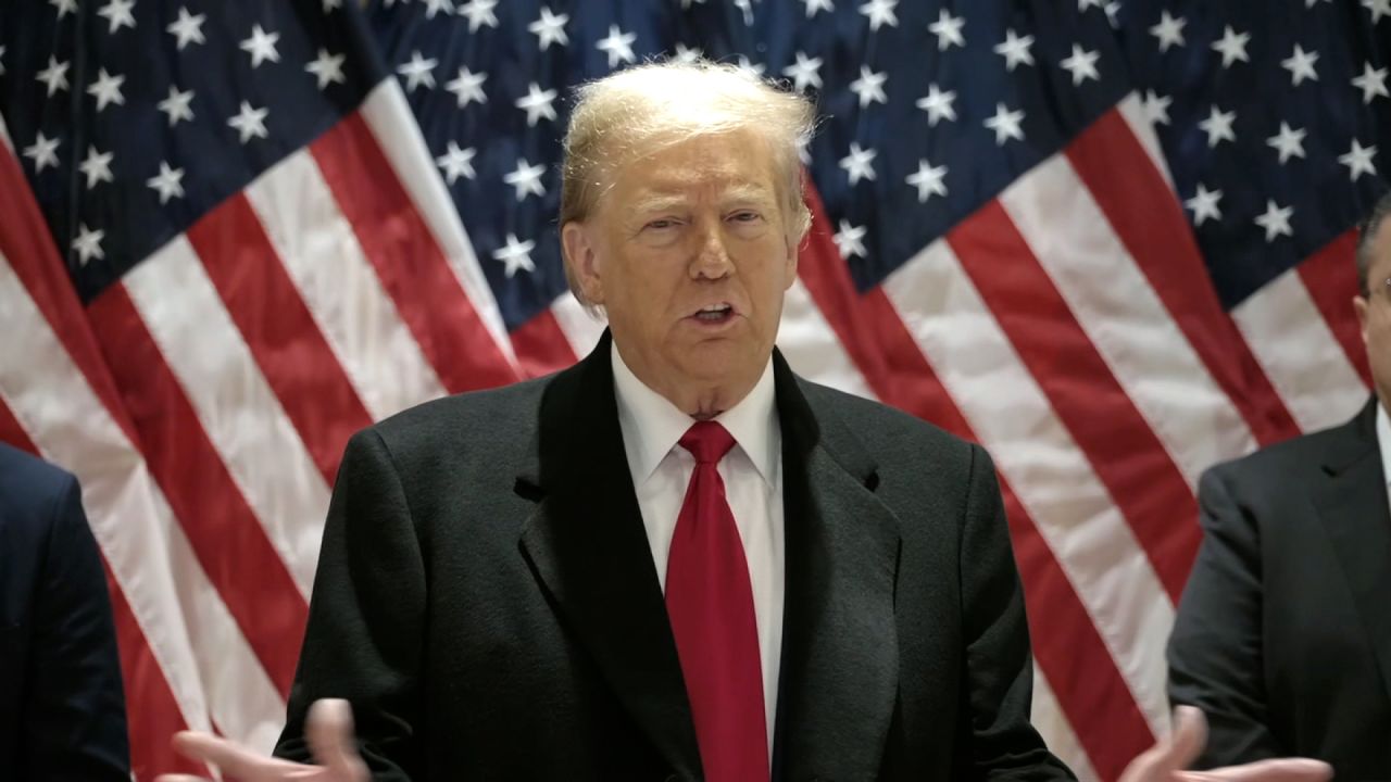 Former President Donald Trump speaks to the press in New York on Monday.