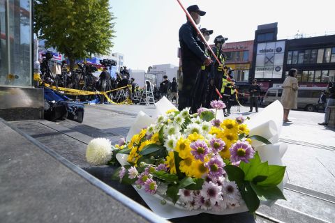 Flowers are laid near the scene in Seoul on Sunday October. 30.