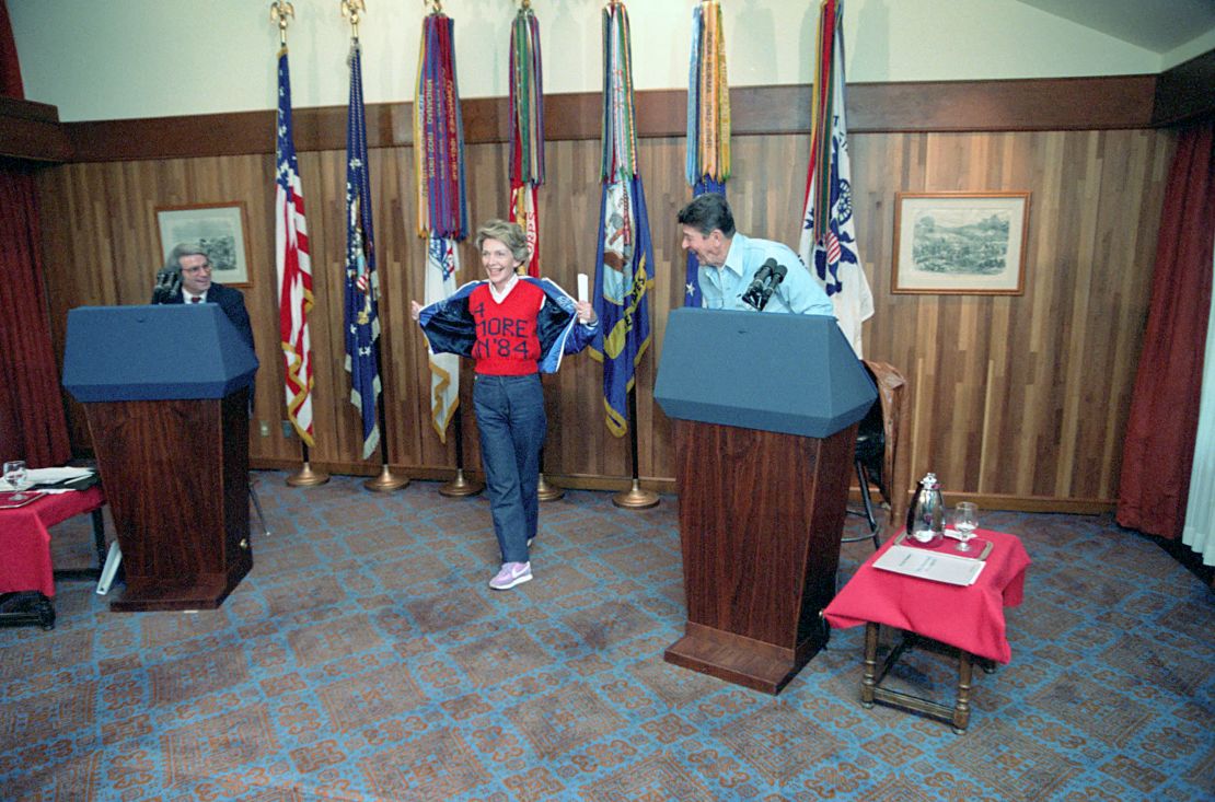 Nancy Reagan showing off her "4 more in '84" sweater during at Camp David, Maryland.