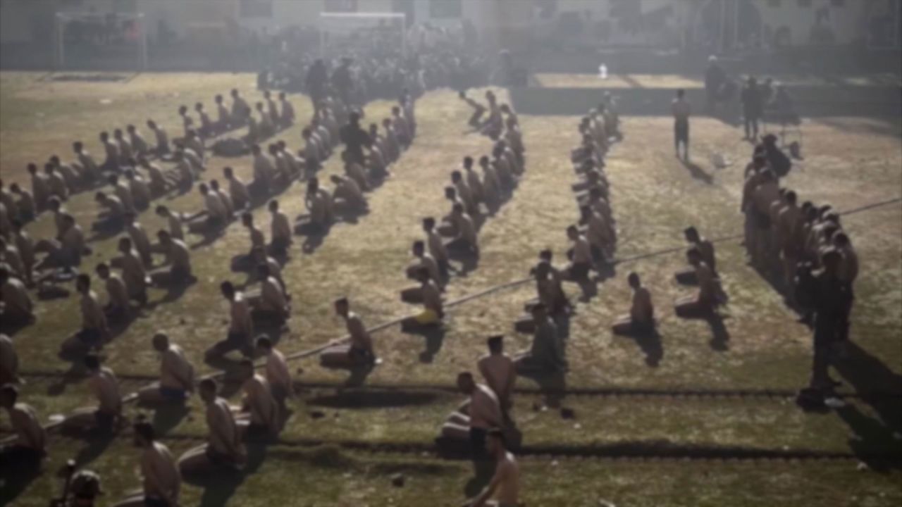 A still from a video appears to show Palestinians detained by the Israel Defense Forces (IDF) in a stadium in northern Gaza. 