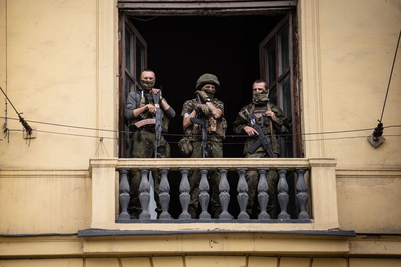 Members of Wagner group stand on the balcony of the circus building in the city of Rostov-on-Don, Russia, on June 24.