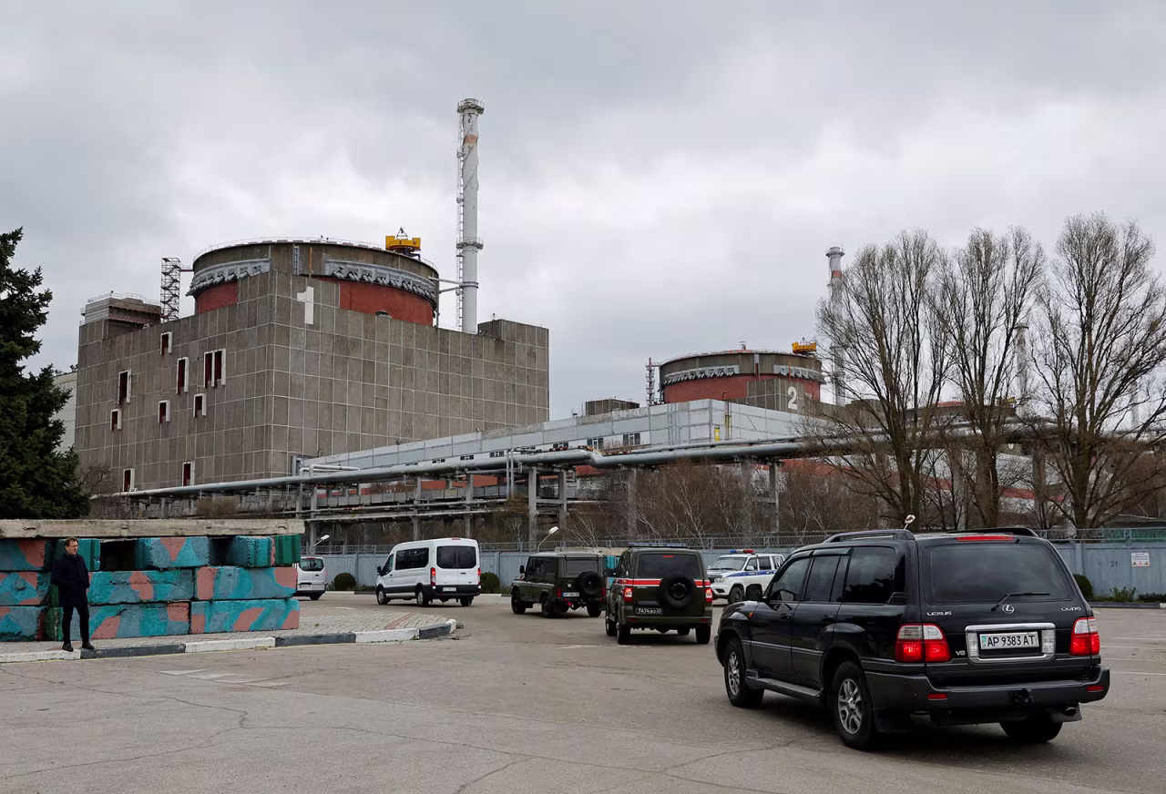 A motorcade transporting the International Atomic Energy Agency  expert mission, escorted by the Russian military, arrives at the Zaporizhzhia Nuclear Power Plant on March 29. 