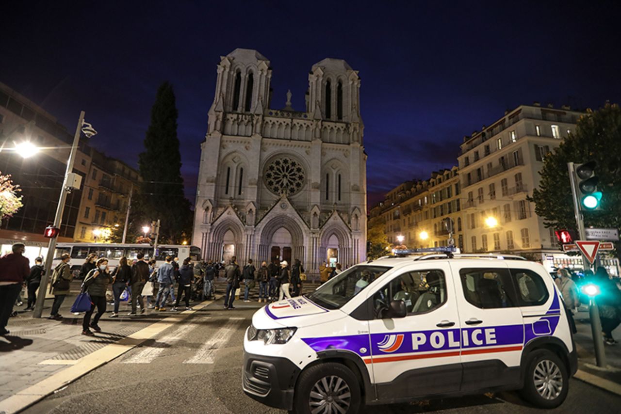 A Police vehicle is parked by the Notre-Dame de l'Assomption Basilica in Nice on Thursday, October 29.