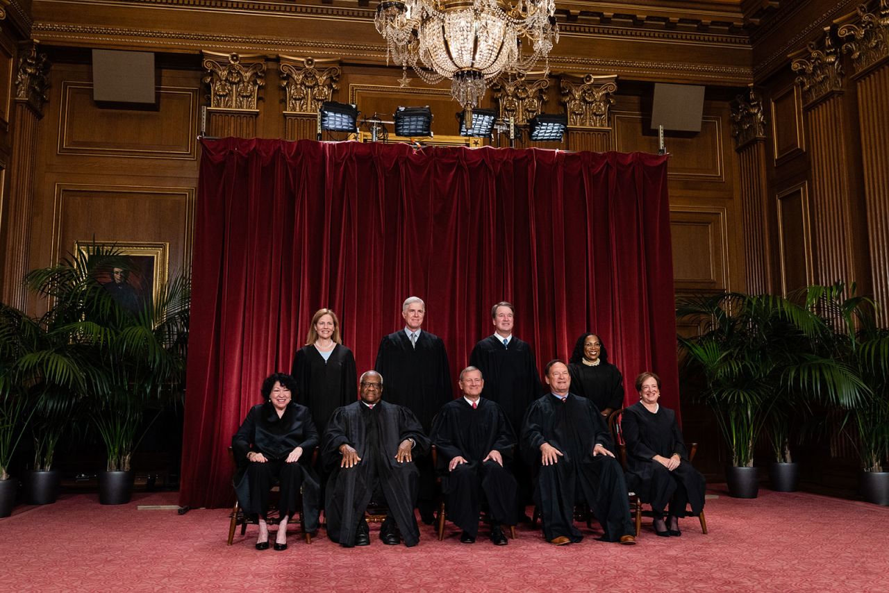 The US Supreme Court justices pose for a group portrait in October. In the front row, from left, are Sonia Sotomayor, Clarence Thomas, Chief Justice John Roberts, Samuel Alito and Elena Kagan. Behind them, from left, are Justices Amy Coney Barrett, Neil Gorsuch, Brett Kavanaugh and Ketanji Brown Jackson.