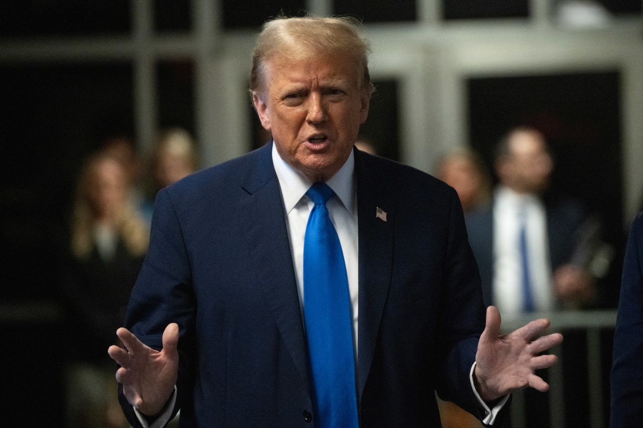 Former President Donald Trump speaks to the press at Manhattan Criminal Court in New York on Monday.