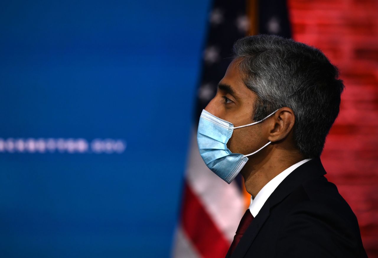 Dr. Vivek Murthy looks on as Joe Biden speaks at The Queen in Wilmington, Delaware, on December 8, 2020.