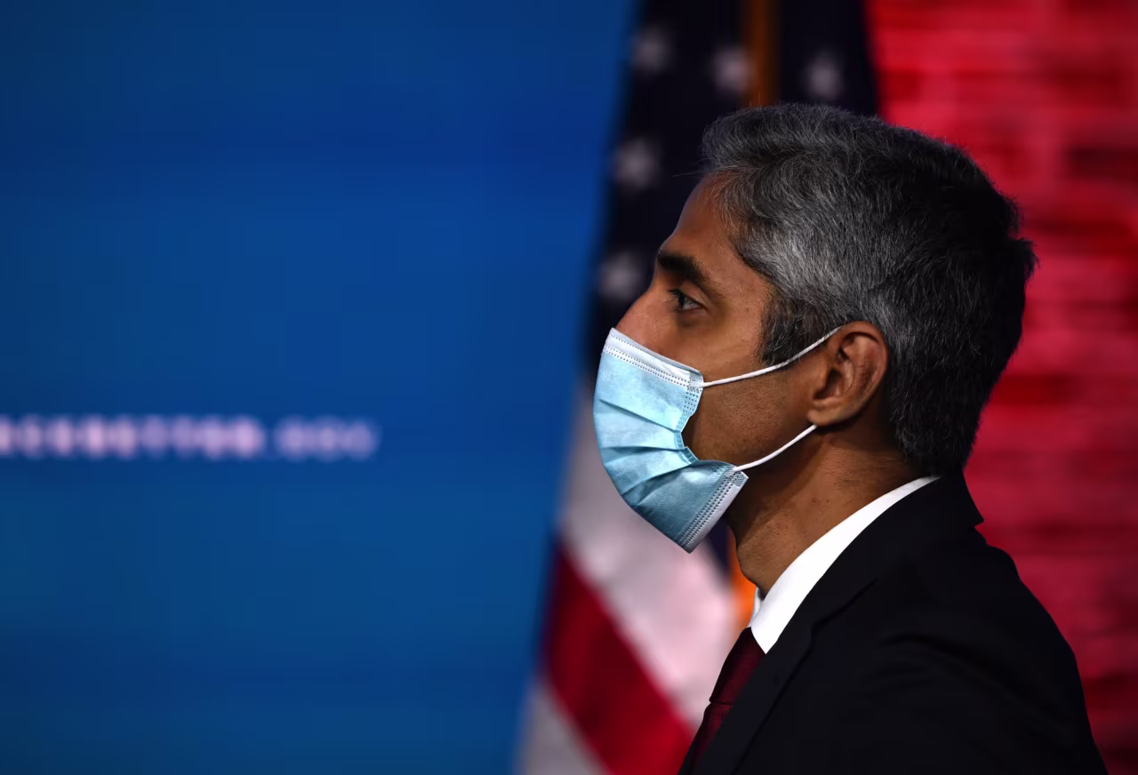 Dr. Vivek Murthy looks on as Joe Biden speaks at The Queen in Wilmington, Delaware, on December 8, 2020.