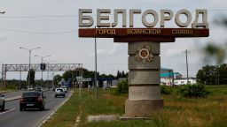 Cars drive past a stele displaying the city name in Belgorod, Russia, on June 8.