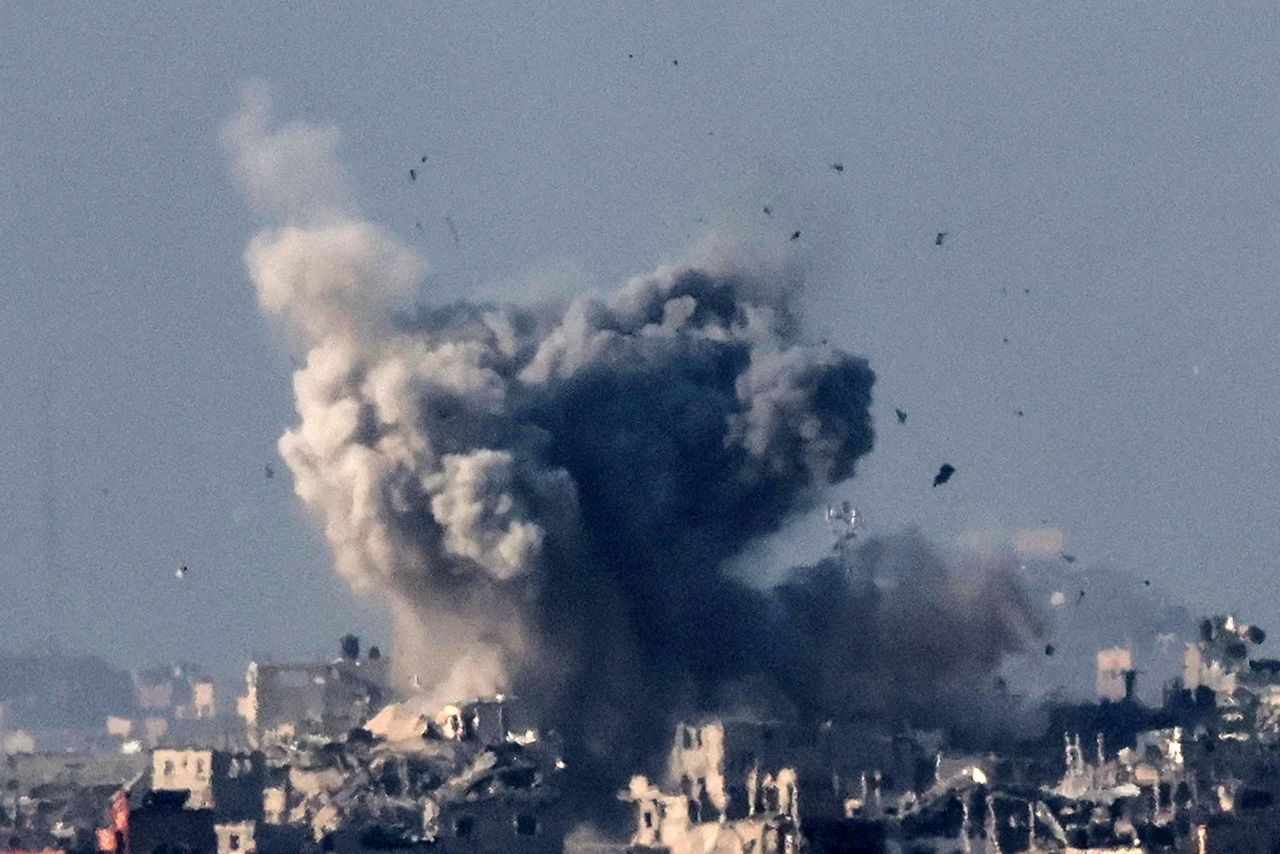 A picture taken from southern Israel near the border with Gaza shows smoke billowing during Israeli bombardment on December 2. 