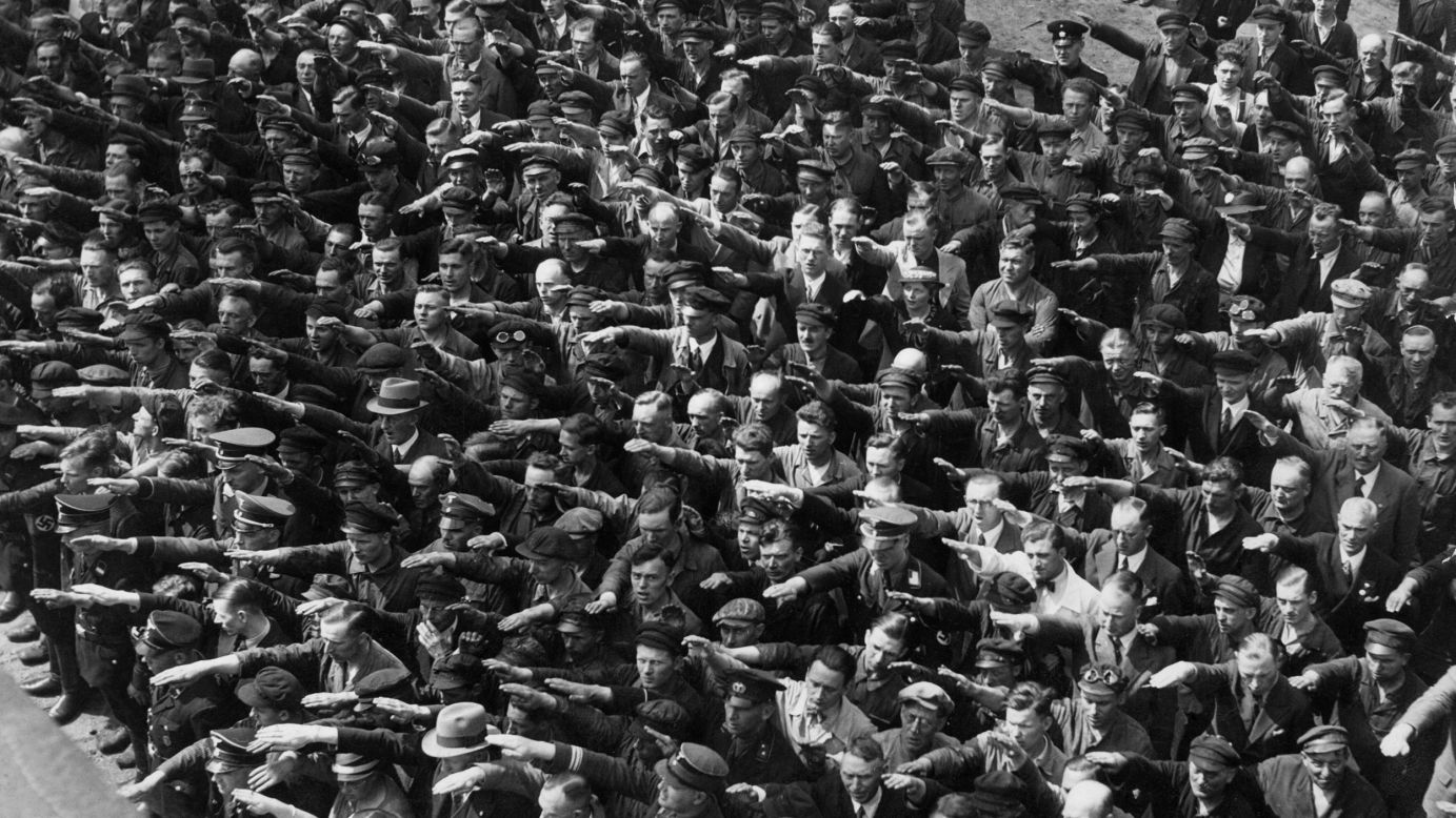 What gives one person the courage to resist fear while their fellow citizens bend the knee to an authoritarian leader? One historian calls it “moral ambition.” If you look closely in this photograph from 1936 Germany you’ll see one man -- in the upper right -- who embodies this characteristic by not saluting Nazi power.