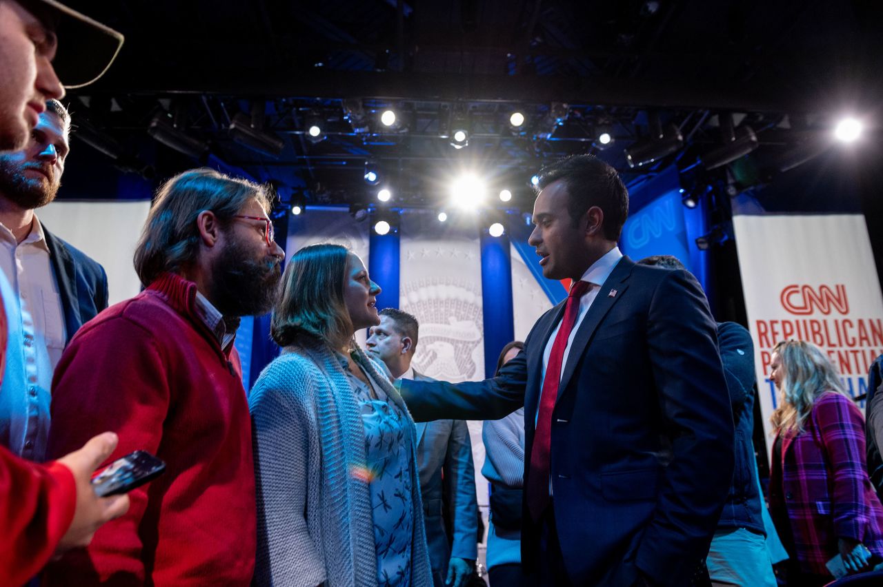 Vivek Ramaswamy meets audience members after the town hall in Iowa.