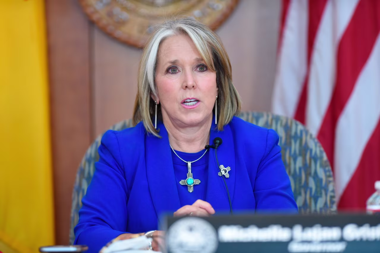 New Mexico Gov. Michelle Lujan Grisham speaks about the uptick in confirmed Covid-19 cases in the state and her decision to hold off on opening more of the economy during a news conference at the state Capitol in Sante Fe on Thursday, June 25. 