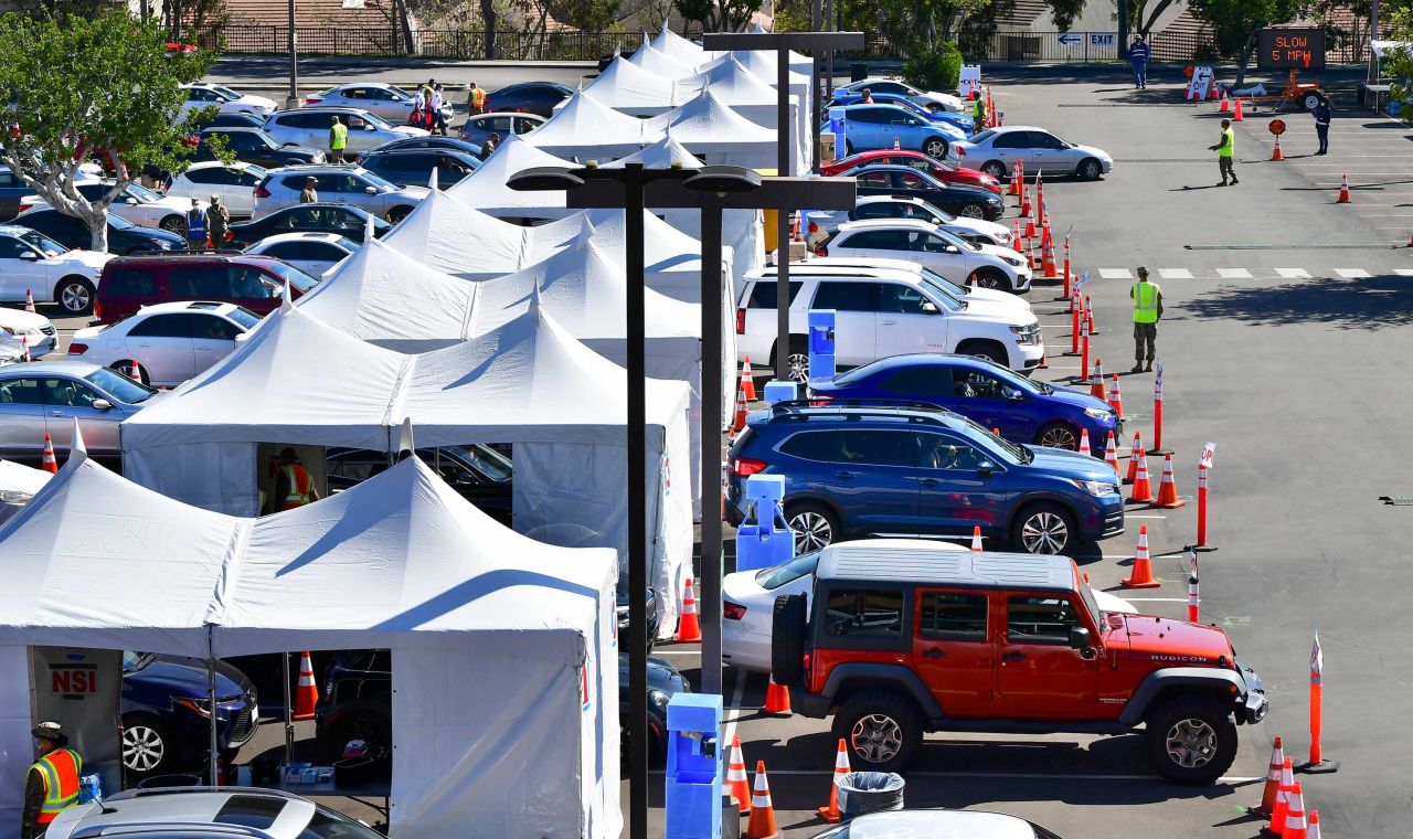 People queue in vehicles as they arrive for vaccinations at California State University of Los Angeles on March 4. 