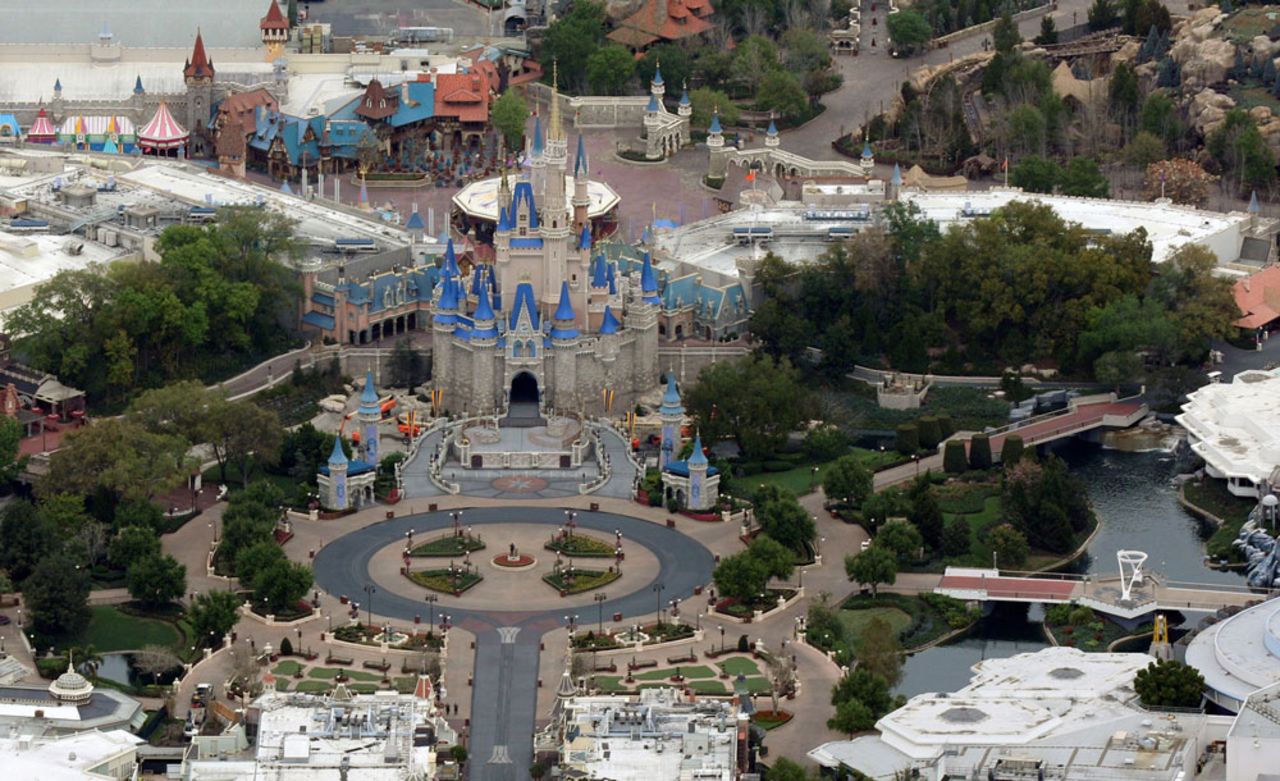 Cinderella Castle is seen at the end of an empty Main Street at Disney's Magic Kingdom theme park after it closed in an effort to combat the spread of coronavirus disease on March 16 in Orlando, Florida.