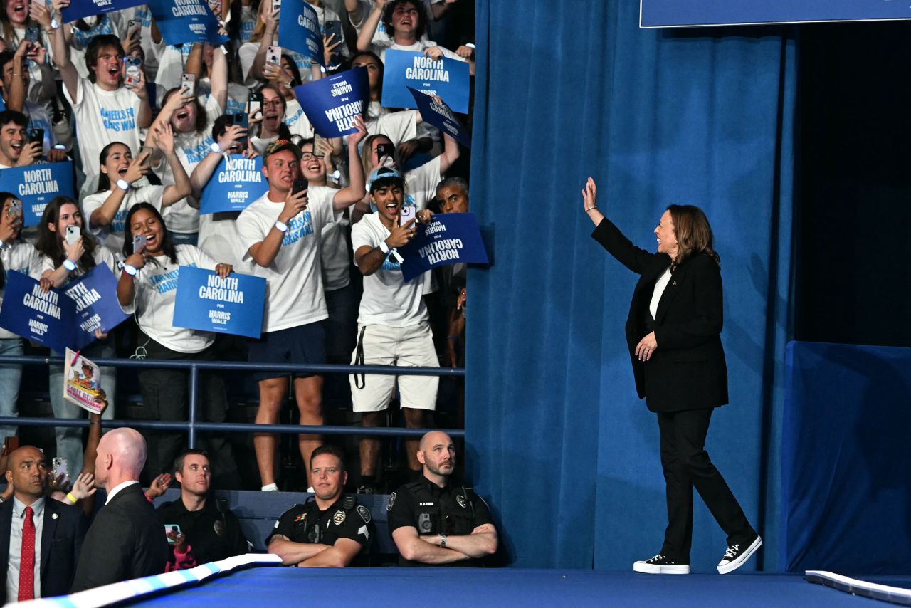 Harris walks on stage as she arrives to speak at a campaign event in Greensboro, North Carolina, on September 12.