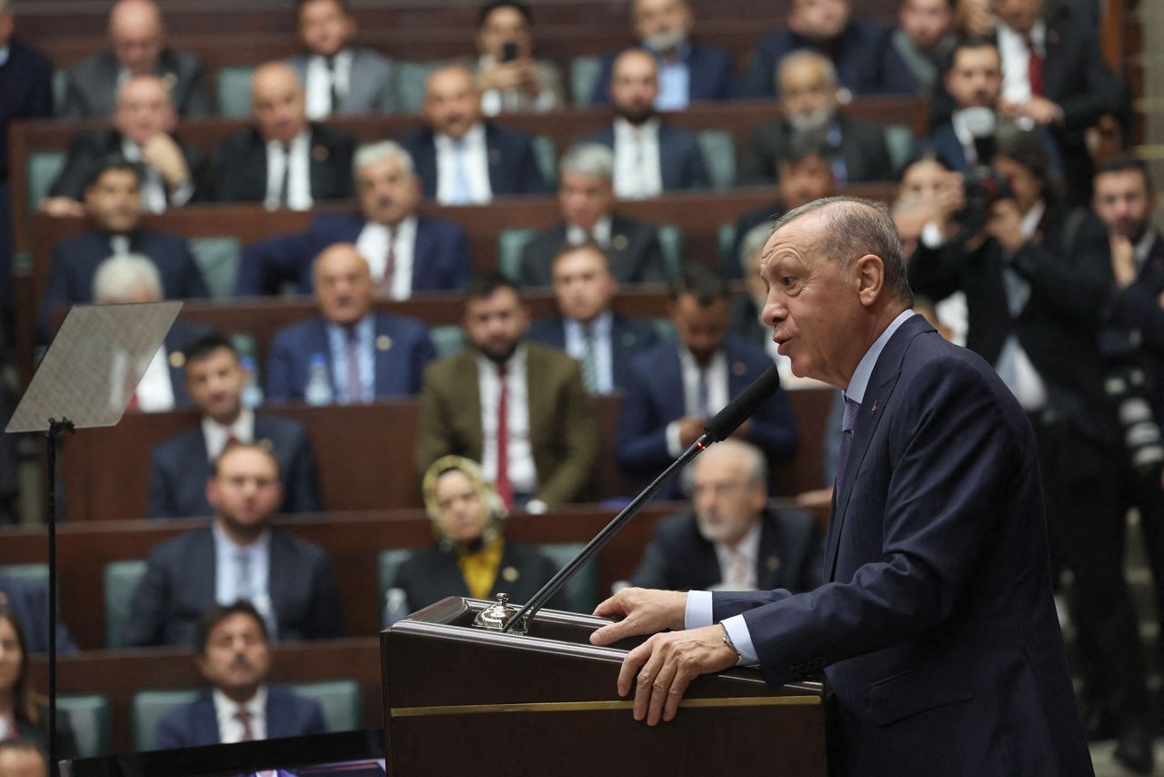 Turkey's President and leader of the Justice and Development (AK) Party Recep Tayyip Erdogan delivers a speech during his party's group meeting at the Turkish Grand National Assembly in Ankara, Turkey, on October 25.