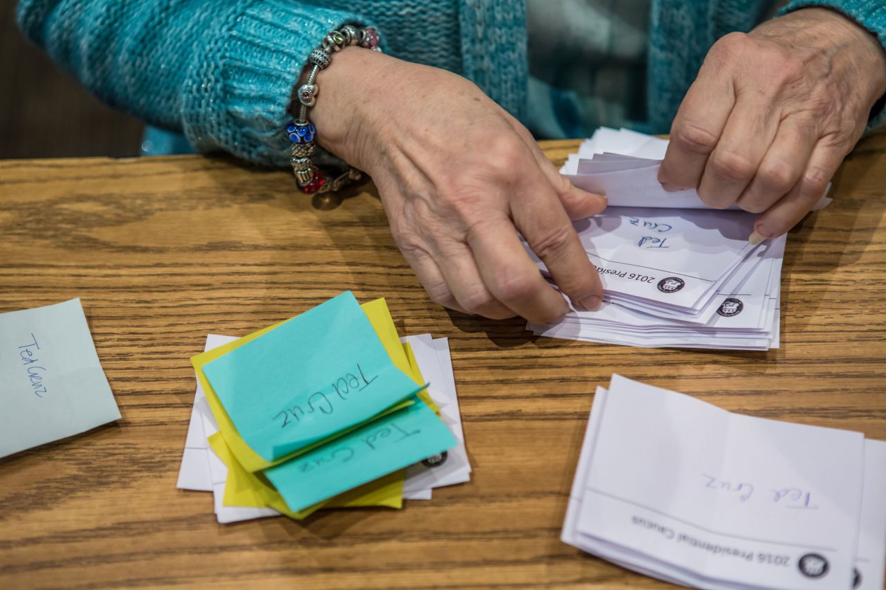 Ballots are counted following the Republican party caucus in February 2016 in West Des Moines, Iowa.