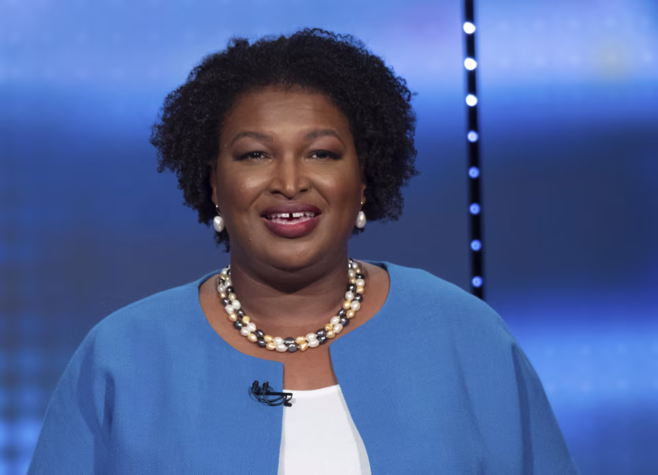 Abrams speaks at the debate Sunday.