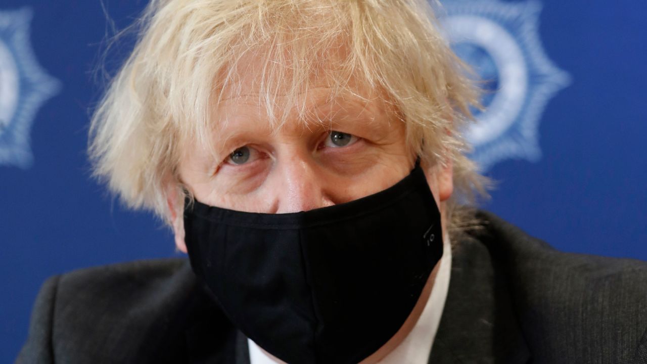 British Prime Minister Boris Johnson visits the South Wales Police Headquarters in Bridgend, Wales, on Wednesday.
