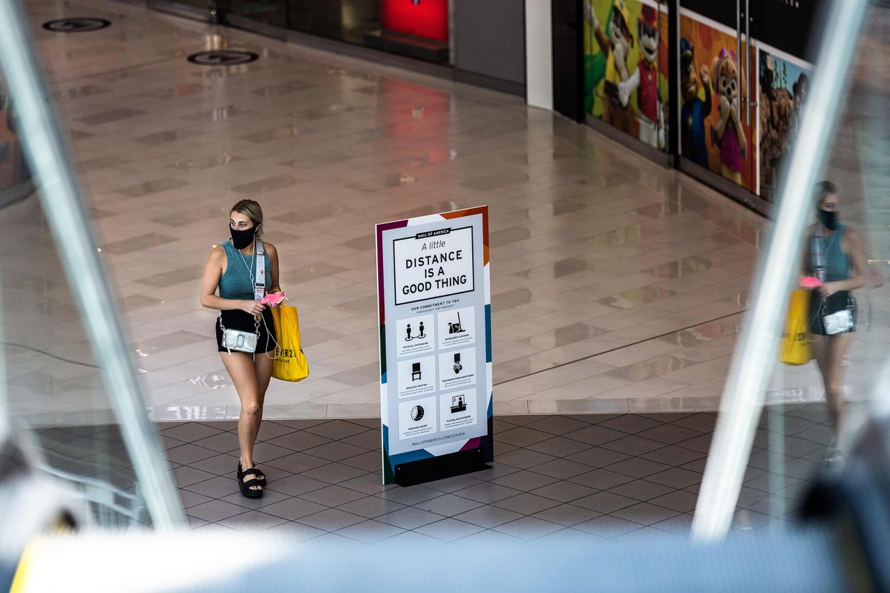 A shopper wearing a face mask walks through the Mall of America on June 16, 2020 in Bloomington, Minnesota, after some of the shops at the mall reopened on June 10.