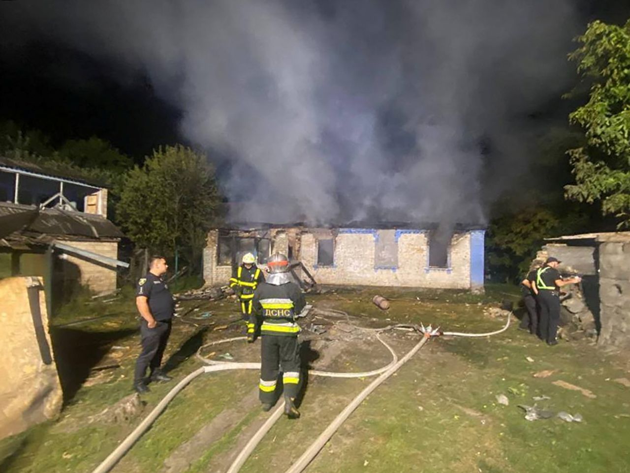 Rescuers work at a site of a residential building heavily damaged by a Russian drone and missile strikes attack in Kyiv region, Ukraine on August 30.